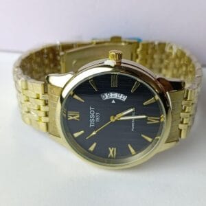 gold-tone Tissot Powermatic 80 with the two-tone dial and Roman numeral XII