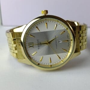 gold-tone Tissot Powermatic 80 with the two-tone dial and Roman numeral XII