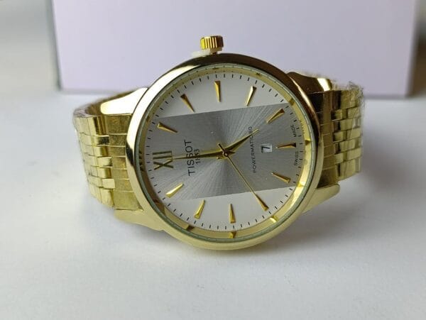 gold-tone Tissot Powermatic 80 with the two-tone dial and Roman numeral XII - Image 4