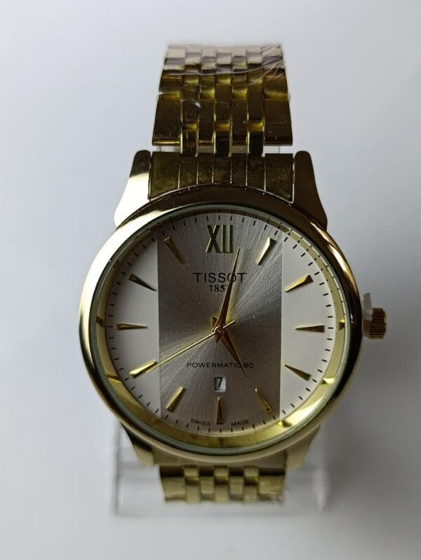 gold-tone Tissot Powermatic 80 with the two-tone dial and Roman numeral XII