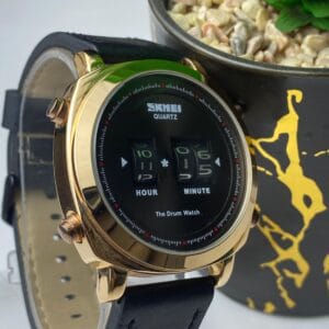 SKMEI "The Drum Watch" Quartz with Unique Rotating Numbers Display - Gold Tone & Black