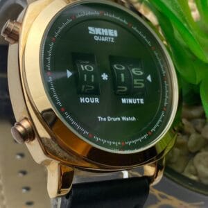 SKMEI "The Drum Watch" Quartz with Unique Rotating Numbers Display - Gold Tone & Black