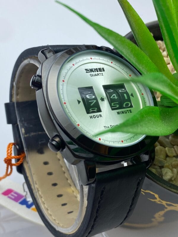 SKMEI "The Drum Watch" Quartz with Unique Rotating Numbers Display - Gold Tone & Black