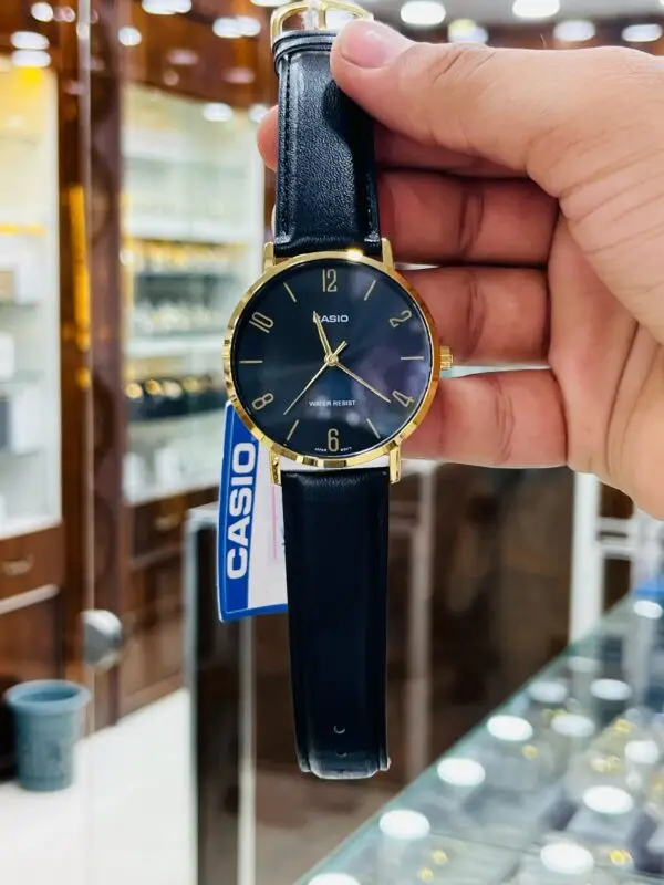 Timeless Style: Casio Gold & Black Analog Watch - Image 4