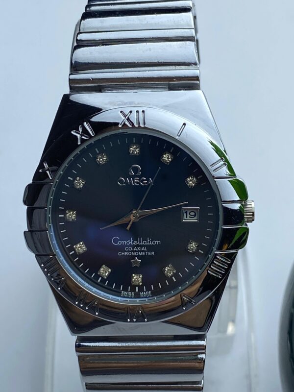 Silver-Toned Omega Watch with Roman Numerals and Diamond Markers - Image 3