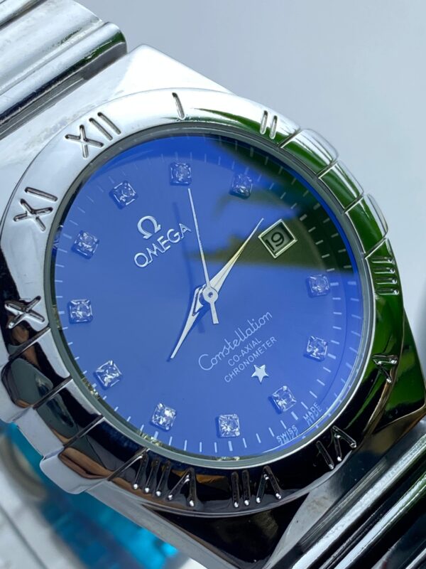 Silver-Toned Omega Watch with Roman Numerals and Diamond Markers - Image 4